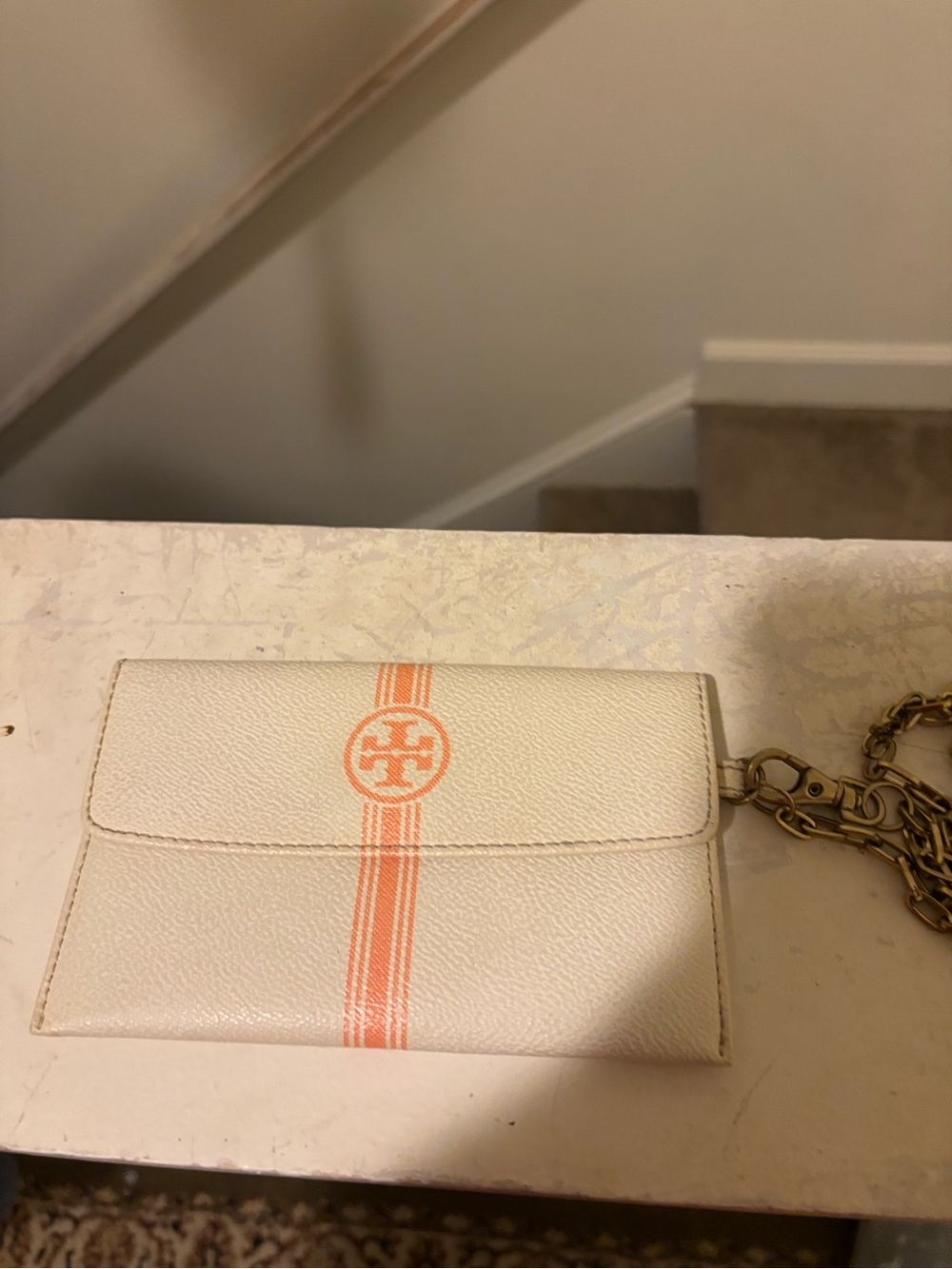 Tory Burch Cream Leather Wristlet with Coral Stripe and Logo